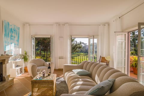 View (from property/room), Balcony/Terrace, Living room, Seating area, Garden view