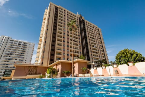 Property building, Day, Pool view, Swimming pool, sunbed