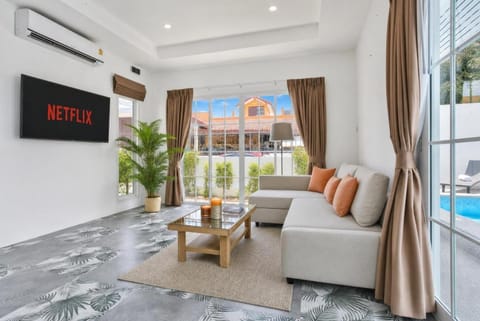 Property building, Communal lounge/ TV room, Spring, Day, TV and multimedia, View (from property/room), Living room, Photo of the whole room, Seating area, Pool view