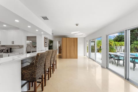 Kitchen or kitchenette, Seating area, Pool view
