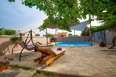 Patio, Day, Garden, Garden view, Pool view, Swimming pool, sunbed
