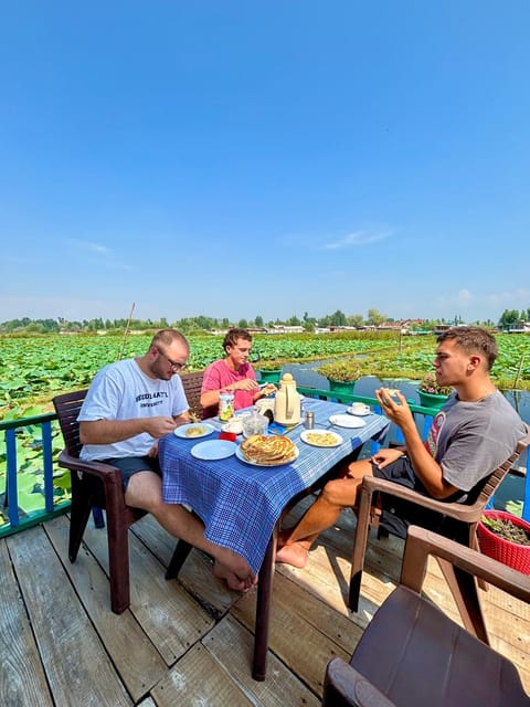 People, Natural landscape, View (from property/room), Balcony/Terrace, Seating area, Food, Guests, Breakfast, group of guests