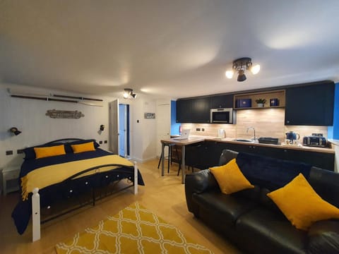 Bed, Living room, Seating area, Bedroom, minibar