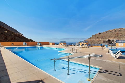 Property building, Living room, Swimming pool