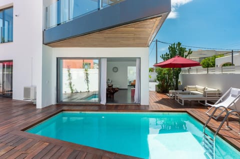 Property building, Living room, Swimming pool
