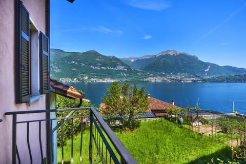 Property building, Nearby landmark, Spring, Day, View (from property/room), Balcony/Terrace, Lake view, Mountain view