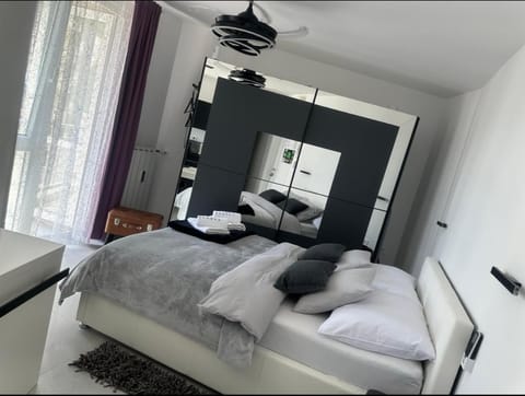 Bed, Bedroom, fireplace, towels, wardrobe