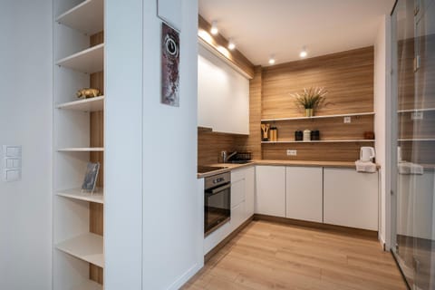 Kitchen or kitchenette, oven, stove