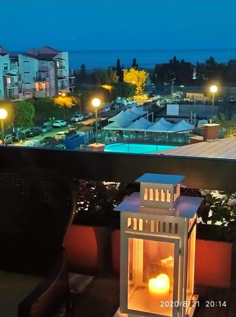 Night, View (from property/room), Balcony/Terrace, Pool view, Swimming pool