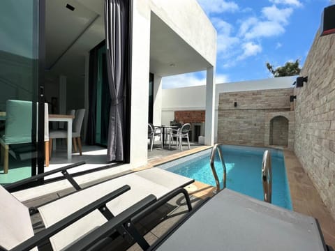 Swimming pool, sunbed