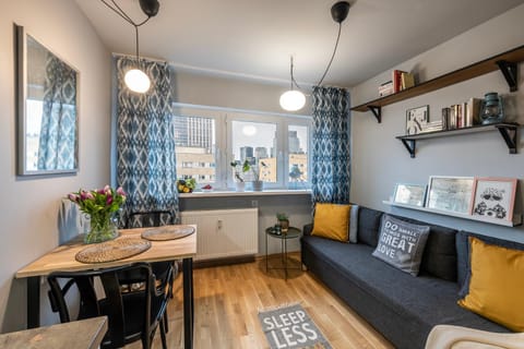 Bed, Living room, Seating area, Dining area