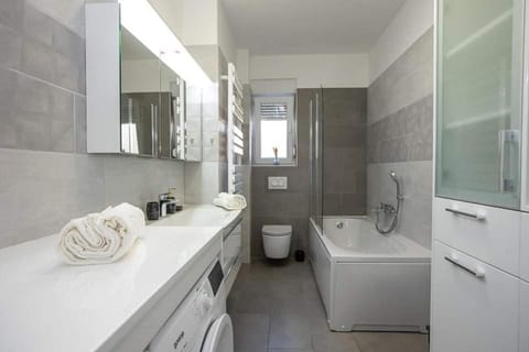 Shower, Toilet, Bathroom, Bath, towels, washing machine, dryer