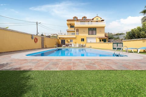 Property building, Living room, Swimming pool