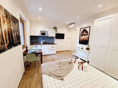 Bed, Living room, Dining area