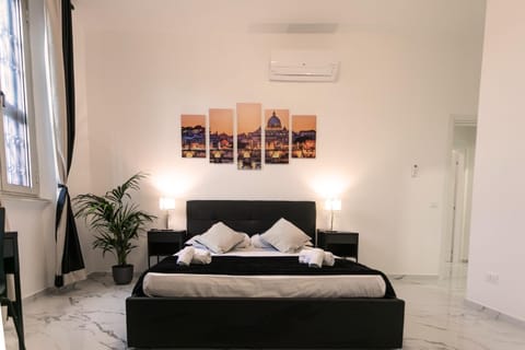 Bed, Photo of the whole room, Bedroom, towels, air conditioner