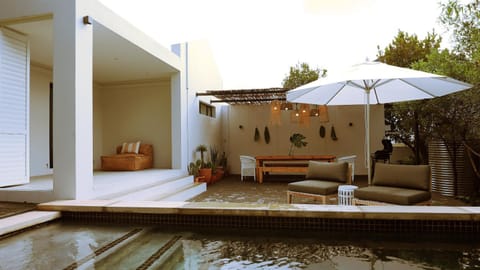 Property building, Patio, Day, Natural landscape, Garden, Seating area, Garden view, Pool view, Swimming pool, sunbed