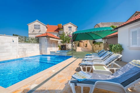 Swimming pool, sunbed