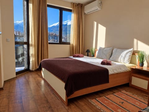 Bed, Natural landscape, Bedroom, Mountain view, towels, air conditioner