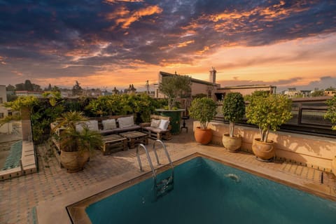 Patio, Day, Natural landscape, Pool view, Swimming pool, Sunrise, Sunset, sunbed