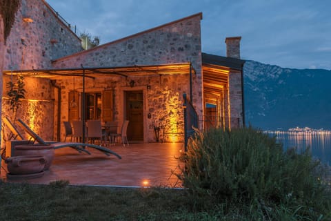 Property building, Patio, Night, Natural landscape, Lake view, Mountain view