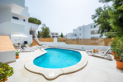 Property building, Living room, Swimming pool