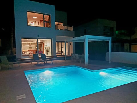 Property building, Living room, Swimming pool