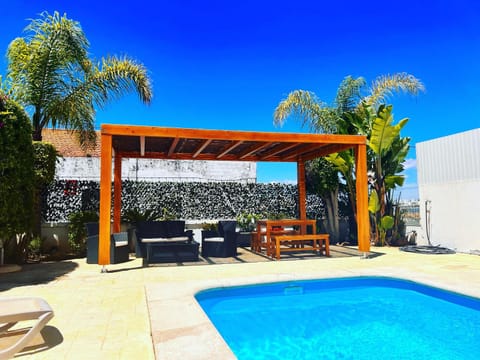 Patio, Off site, Pool view, Swimming pool, sunbed