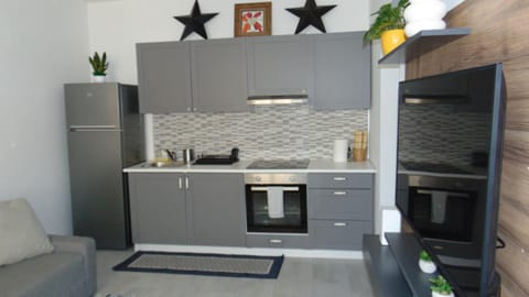 Kitchen or kitchenette, stove