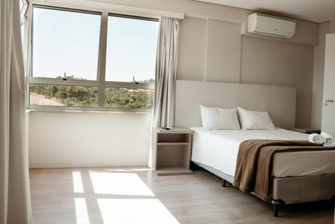 Bed, Photo of the whole room, Bedroom, towels, air conditioner