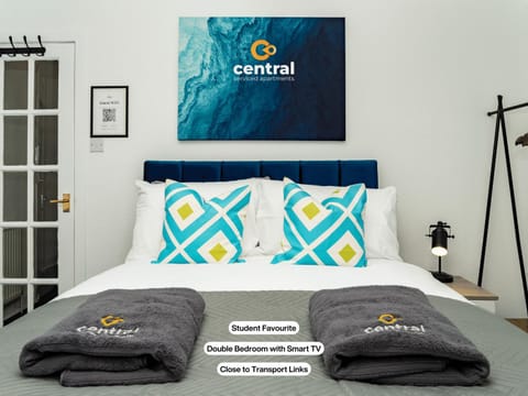Bed, Property logo or sign, Photo of the whole room, Logo/Certificate/Sign, Bedroom, Certificate/Award, towels