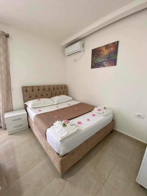 Bed, Photo of the whole room, Bedroom, towels, air conditioner