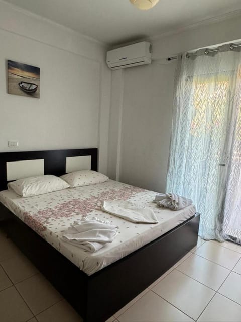 Bed, Photo of the whole room, Bedroom, towels, air conditioner