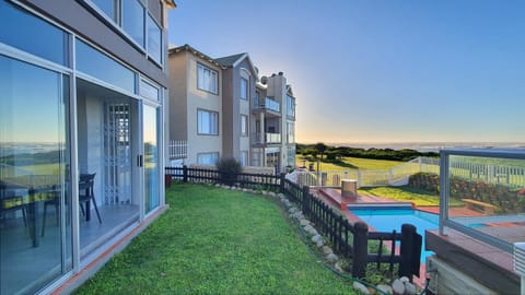 Property building, Patio, Natural landscape, Garden, Balcony/Terrace, Beach, Beach, Swimming pool