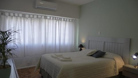 Bed, Photo of the whole room, Bedroom, towels, air conditioner