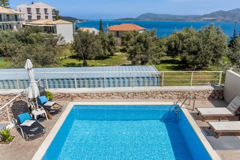 Property building, Living room, Swimming pool
