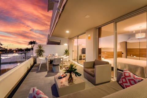 Natural landscape, View (from property/room), Balcony/Terrace, Living room, Seating area, Dining area, Bedroom, Sunset