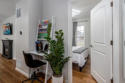 Bed, TV and multimedia, Seating area, Bedroom, hair dresser