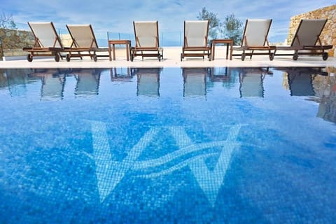 Patio, Natural landscape, Pool view, Swimming pool, sunbed
