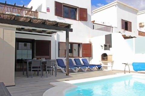 Property building, Living room, Swimming pool