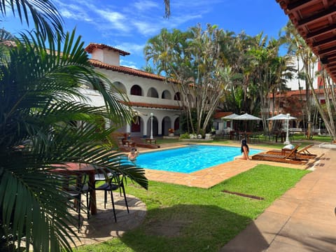 Property building, Patio, Day, Garden, Garden view, Pool view, Swimming pool, sunbed