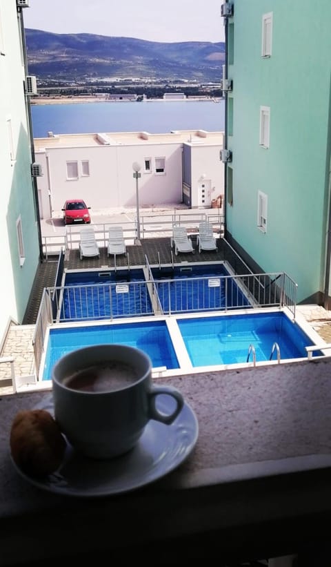 View (from property/room), Balcony/Terrace, Pool view, Swimming pool