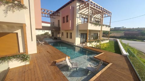 Property building, Day, Natural landscape, Pool view, Swimming pool, sunbed, Internal: Not applicable to any particular room