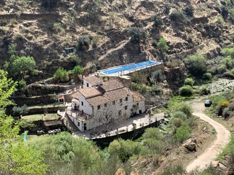 Property building, Spring, Day, Natural landscape, Bird's eye view, Mountain view, Pool view, Swimming pool