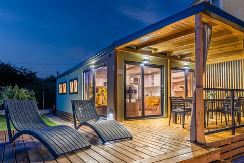 Property building, Patio, Night, View (from property/room), Balcony/Terrace, Balcony/Terrace, Seating area, Dining area, sunbed