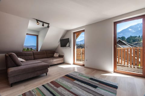 View (from property/room), Living room, Seating area, Mountain view