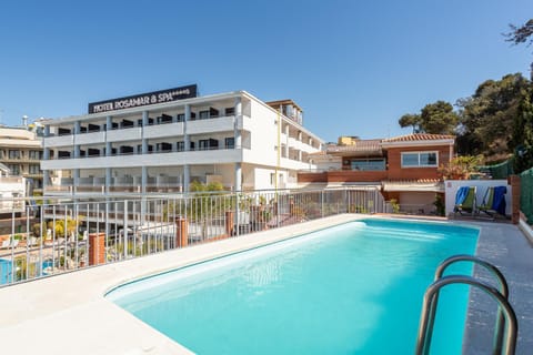 Property building, Living room, Swimming pool