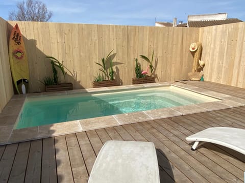 Swimming pool, sunbed