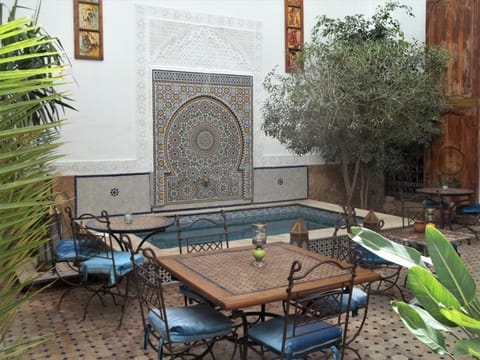 Patio, Dining area, Pool view