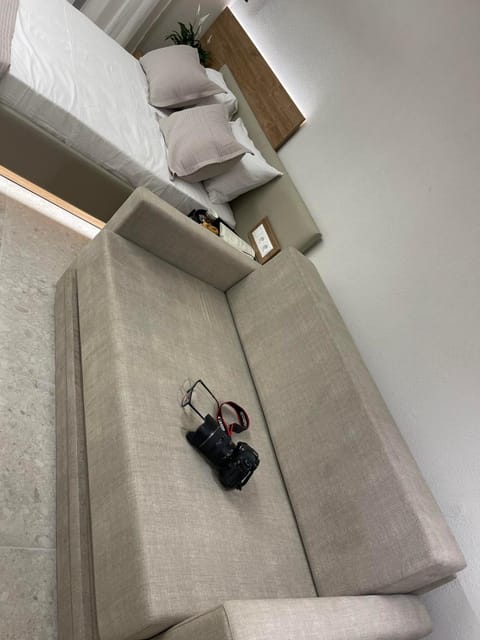 Bed, Living room, Seating area, Bedroom