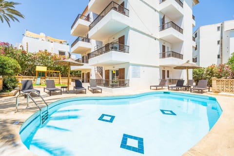 Property building, Living room, Swimming pool
